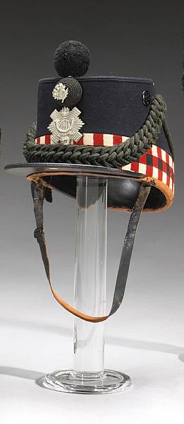 Appraisal: A British post- other ranks blue cloth shako for the