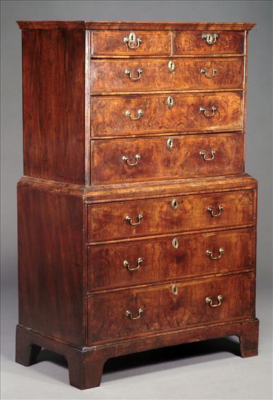 Appraisal: A George II walnut and featherbanded chest on chest circa