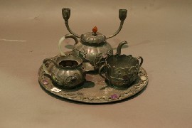 Appraisal: A Pewter tea service with tray set with stones together