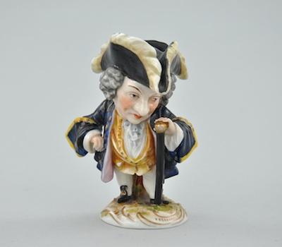 Appraisal: A Capodimonte Figurine of a Gentleman The caricature stands on