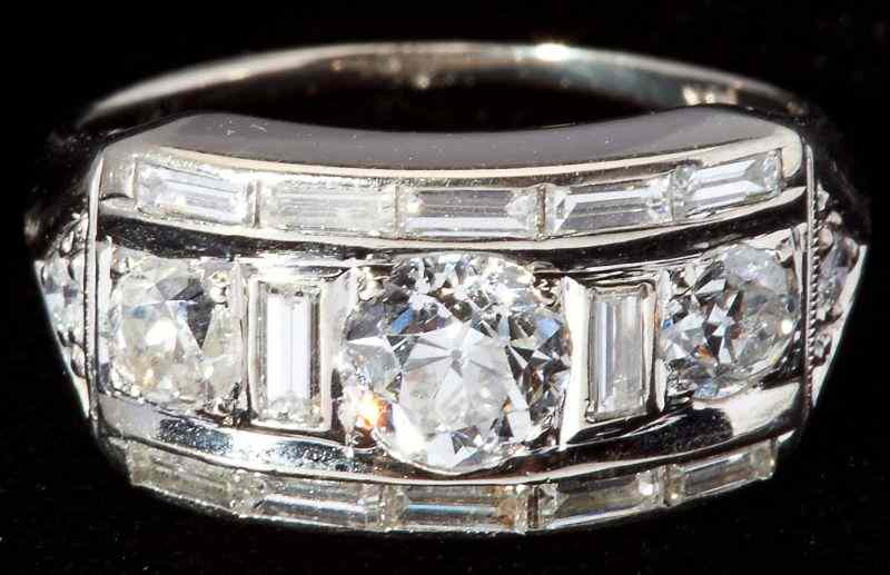 Appraisal: Three Stone Diamond Ringset in the center with an Old