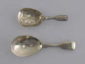 Appraisal: Two George IV silver caddy spoons one fiddle pattern WB