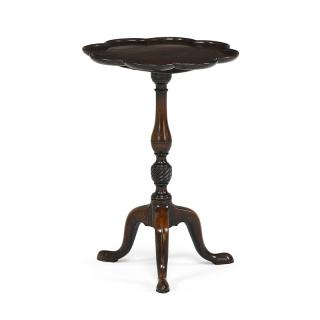 Appraisal: GEORGE II MAHOGANY TILT TOP TABLE Lobed dished top on