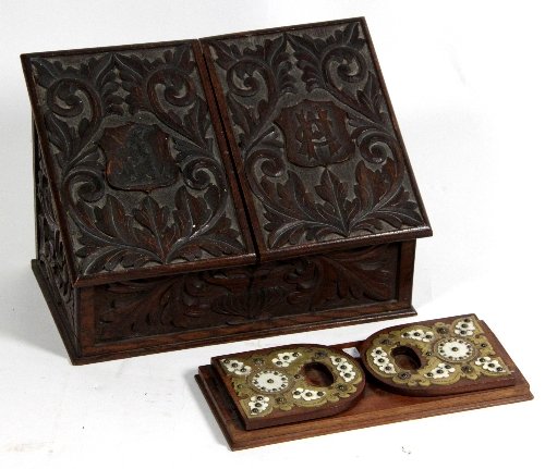 Appraisal: A th Century carved oak stationery box the doors with