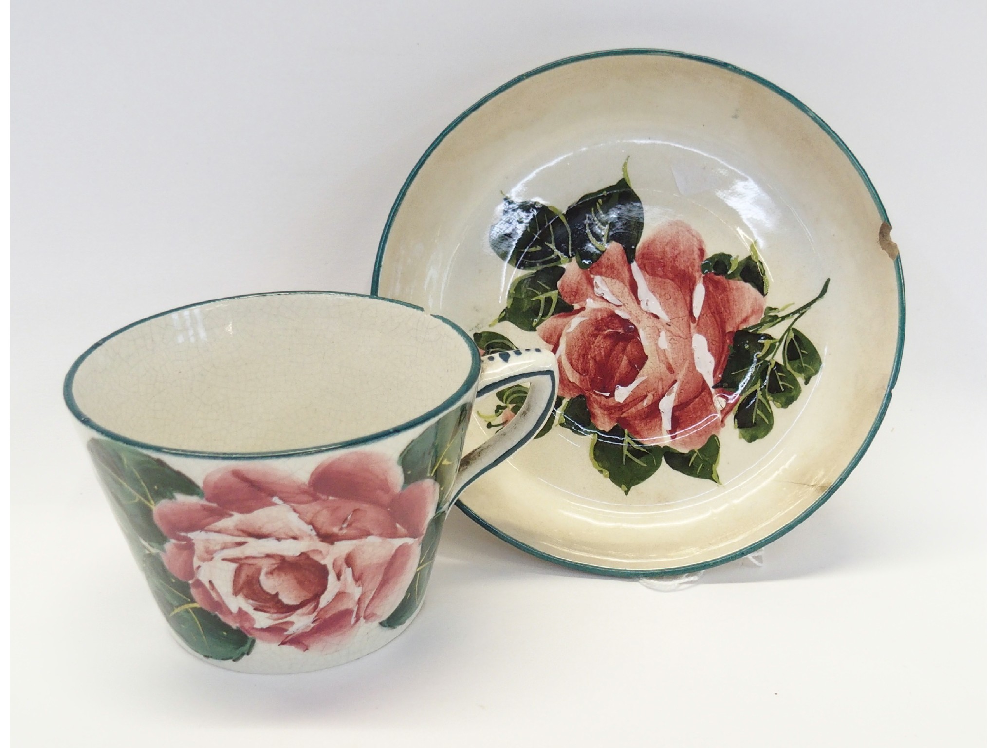 Appraisal: Wemyss Cabbage rose teacup with saucer