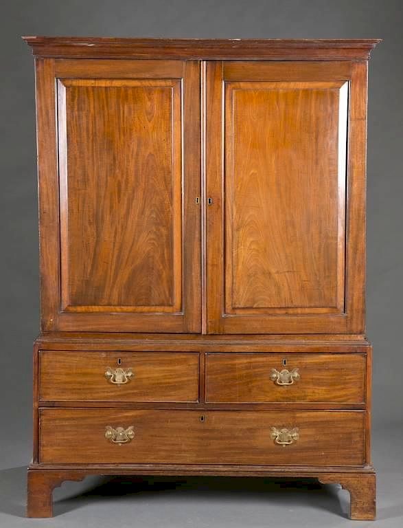 Appraisal: English George III style linen press A n English George