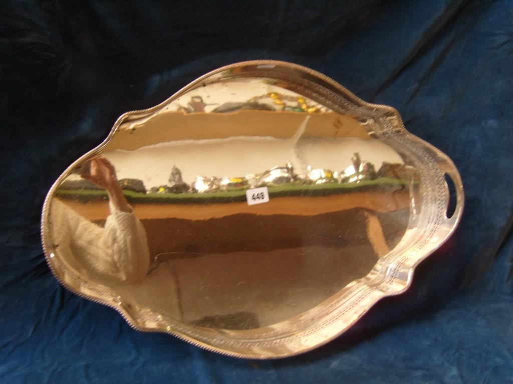 Appraisal: A substantial silver plated gallery tray of shaped oval outline