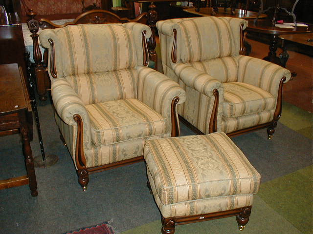 Appraisal: A pair of reproduction Regency deep upholstered armchairs and matching