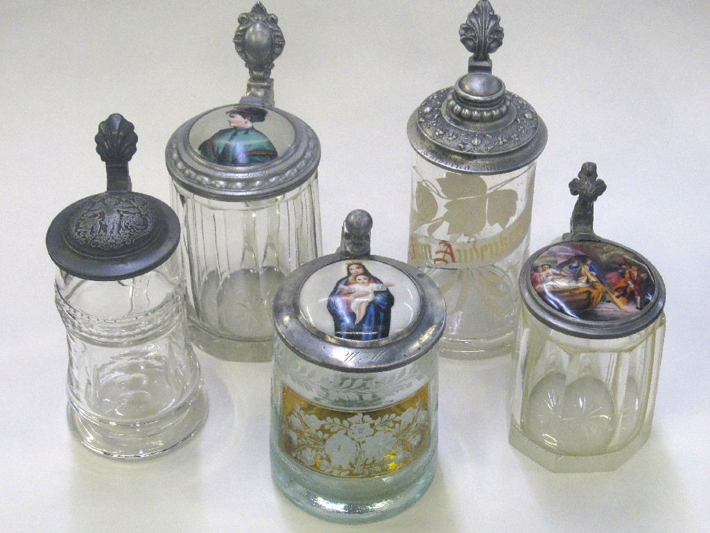 Appraisal: Five various glass steins three with painted porcelain lids