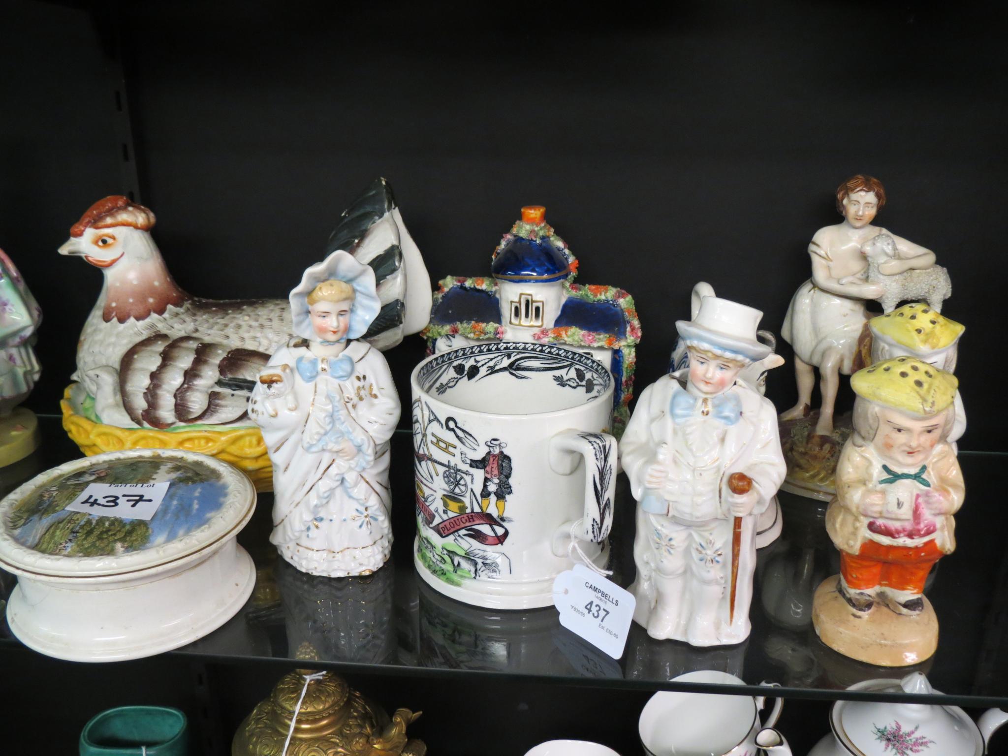 Appraisal: A pair of th century porcelain nodding-head figures in pottery