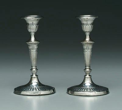 Appraisal: Pair English silver candlesticks oval with urn sockets tapered fluted