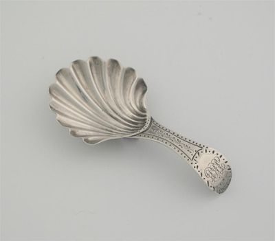 Appraisal: A George III spoon with fluted bowl engraved stem initialled