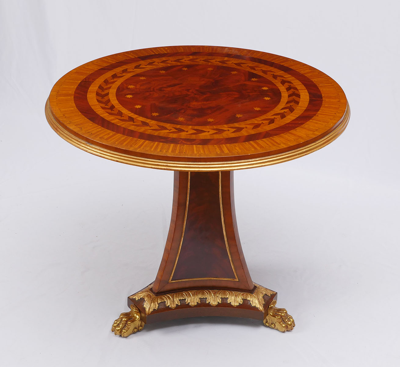 Appraisal: MAITLAND SMITH TABLE Round Maitland Smith table having a book