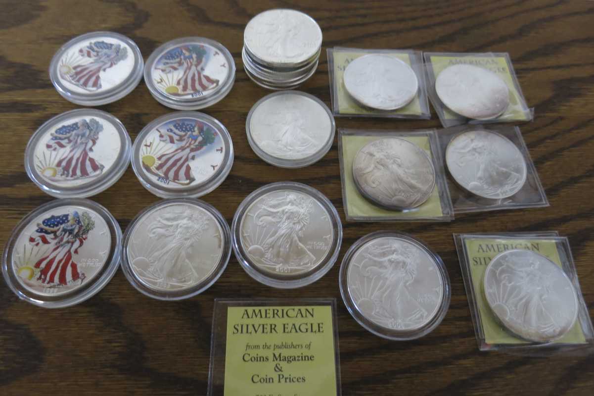 Appraisal: TWENTY-ONE AMERICAN SILVER EAGLE COINS each a one ounce bullion