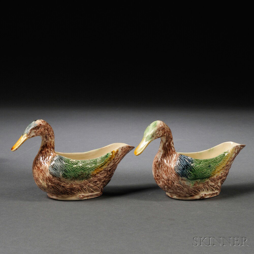 Appraisal: Pair of Staffordshire Cream-colored Earthenware Duck-form Sauceboats England c each