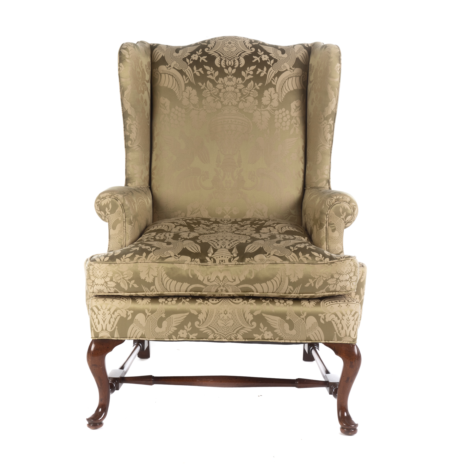 Appraisal: QUEEN ANNE STYLE UPHOLSTERED WING CHAIR With damask upholstery on