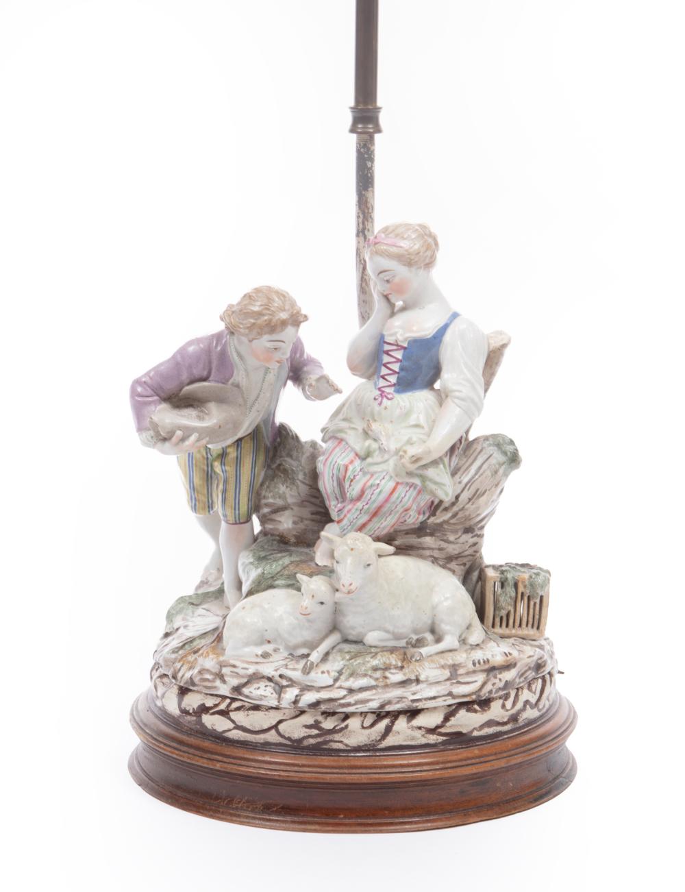 Appraisal: Meissen-Style Polychrome Porcelain Figural Group of an Amorous Couple with