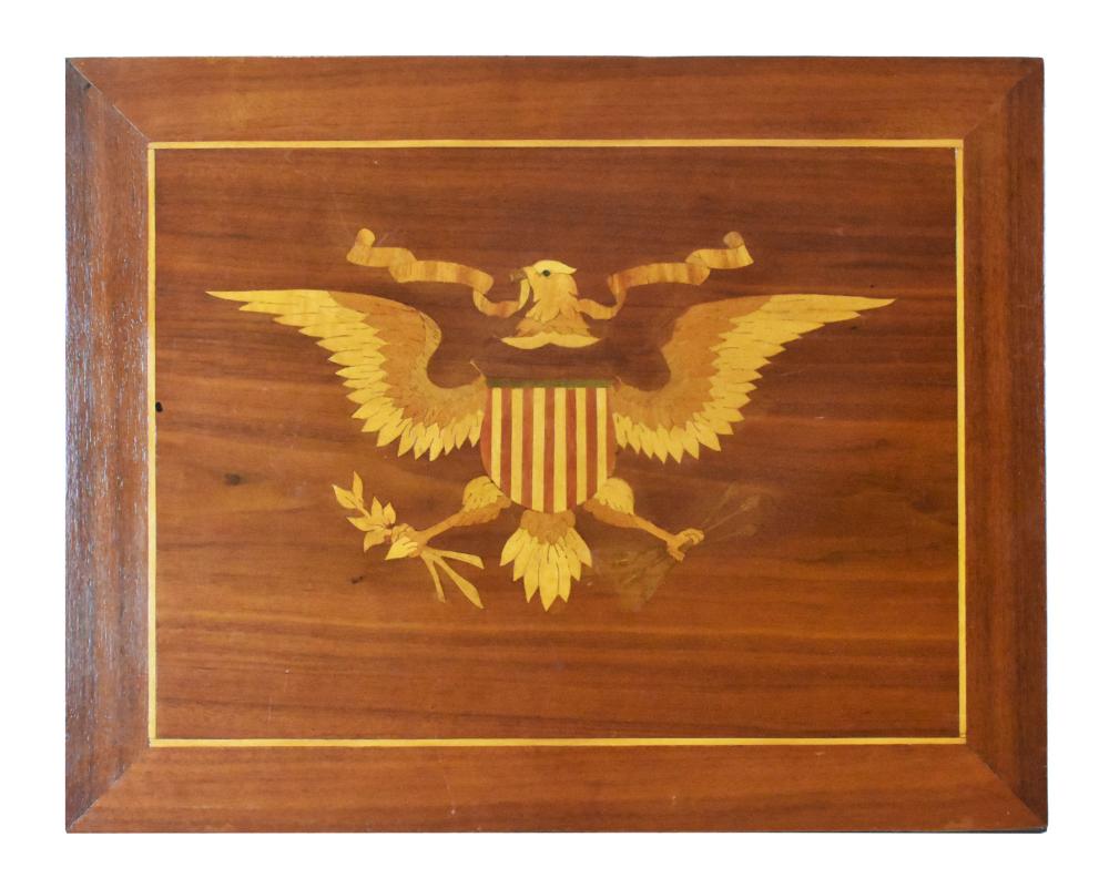 Appraisal: AMERICAN EAGLE VARIOUS WOOD INLAID PLAQUEThe displayed eagle with shield