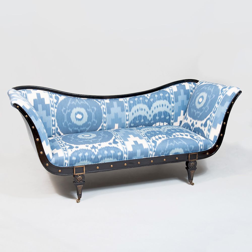 Appraisal: Regency Style Ebonized Sofa Upholstered in Ikat Print Fabric x