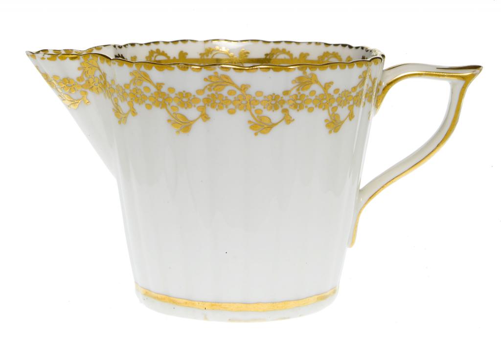 Appraisal: A DERBY REEDED CREAM JUG with wishbone handle finely gilt