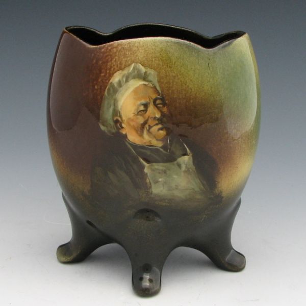 Appraisal: Owens Lightweight standard glaze footed vase with portrait of a