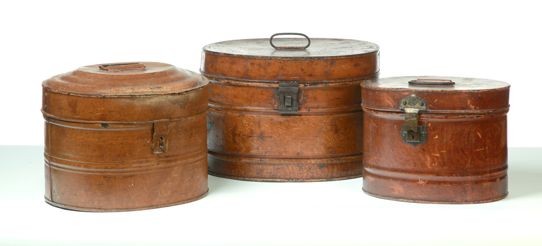 Appraisal: THREE ENGLISH HAT TINS Second half- th century Painted tin