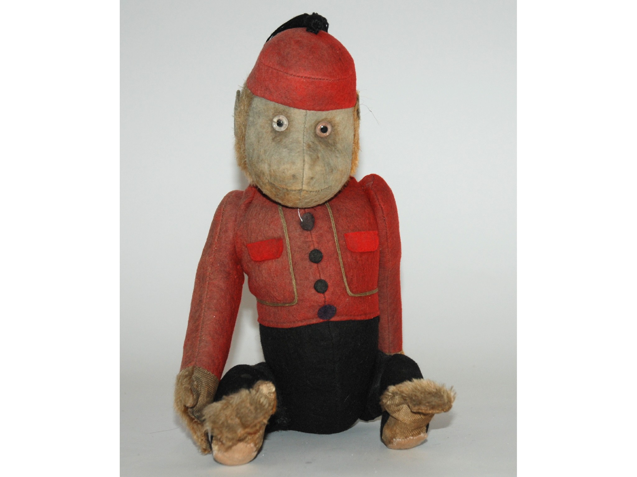 Appraisal: A possibly Schuco Yes No Bellhop monkeywith integral red and