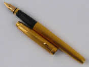 Appraisal: A gold plated Parker fountain pen Made in France K