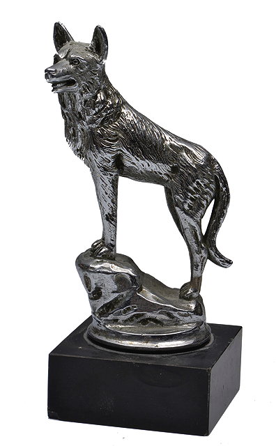 Appraisal: A SILVERED CAR MASCOT in the form of a wolf