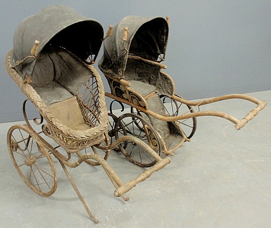 Appraisal: - Two similar Victorian stroller carriages with black leather folding