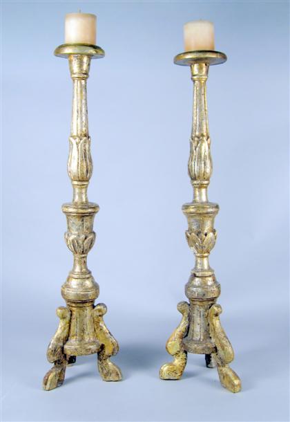 Appraisal: Pair of Continental giltwood altar candlesticks th century Each with