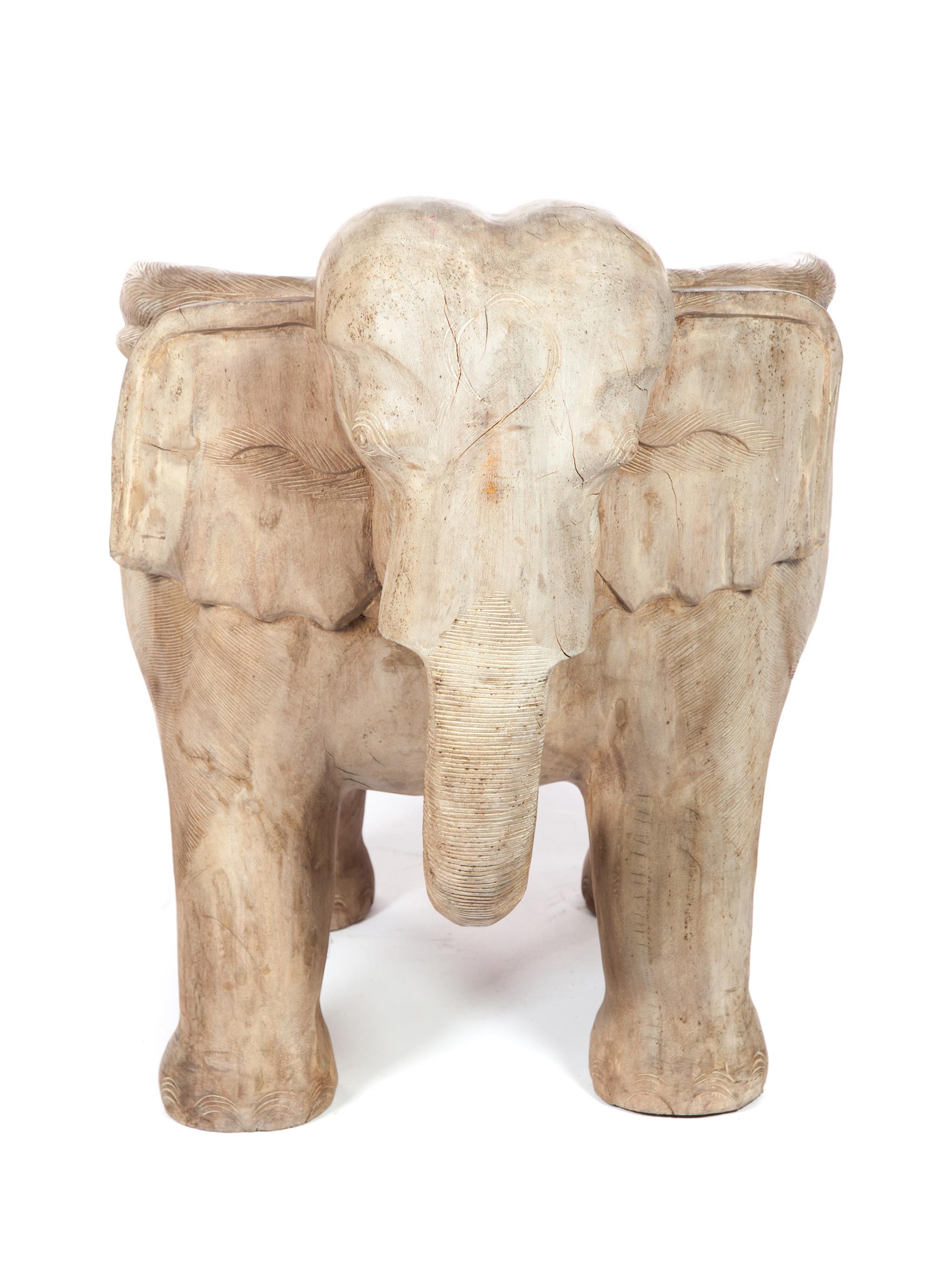 Appraisal: CARVED HARD WOOD ELEPHANT CHAIR Twentieth century Asian elephant with