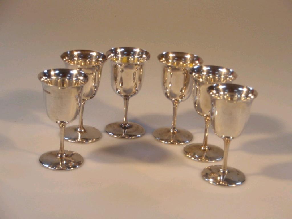 Appraisal: A set of six George V silver goblets with plain