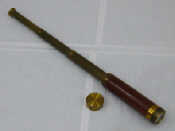 Appraisal: A mahogany cased three draw brass telescope by J Widdowson