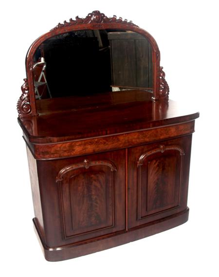 Appraisal: A Victorian mahogany mirror backed sideboard the arched floral carved