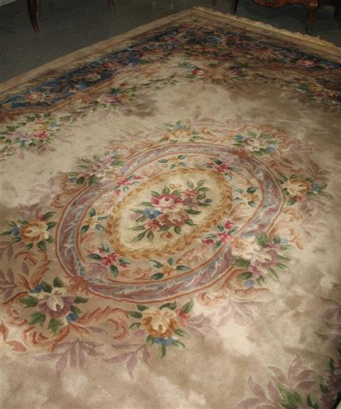 Appraisal: MODERN CHINESE BLUE AND BEIGE FLORAL RUG Late th century