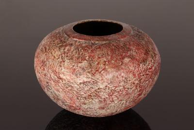 Appraisal: Philip Evans born thrown spherical vessel textured red and white