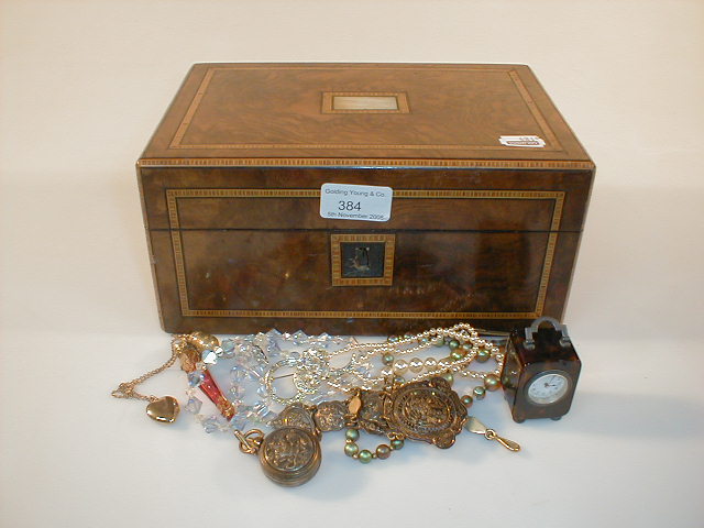 Appraisal: A walnut jewellery box with stringing and contents of small