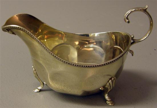 Appraisal: Victorian silver sauce boat with beaded border shell moulded spout