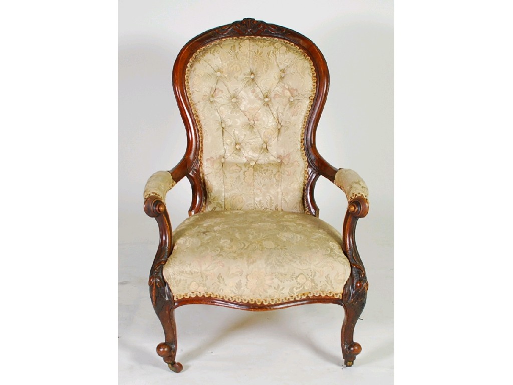 Appraisal: VICTORIAN CARVED WALNUT GENT'S EASY ARMCHAIR the floral carved top