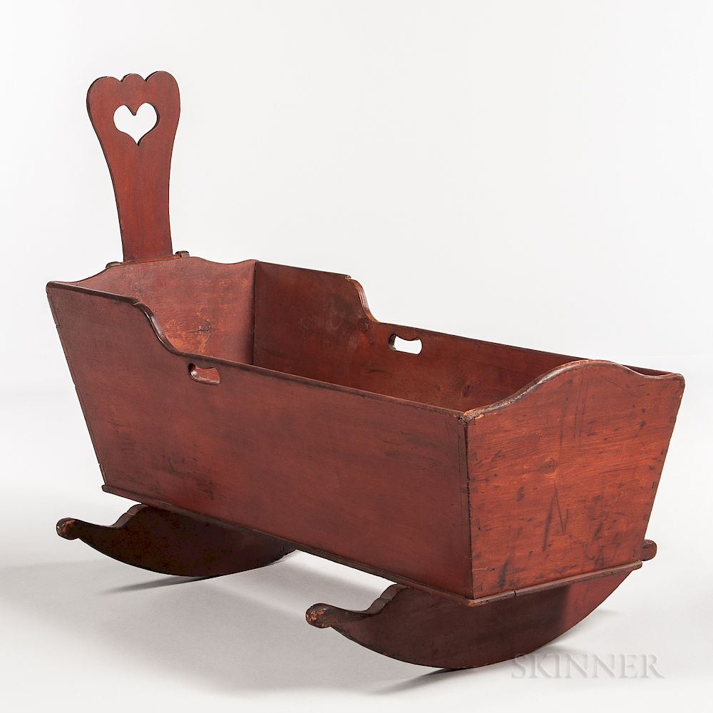 Appraisal: Red-painted Cradle with Heart Cutout Red-painted Cradle with Heart Cutout