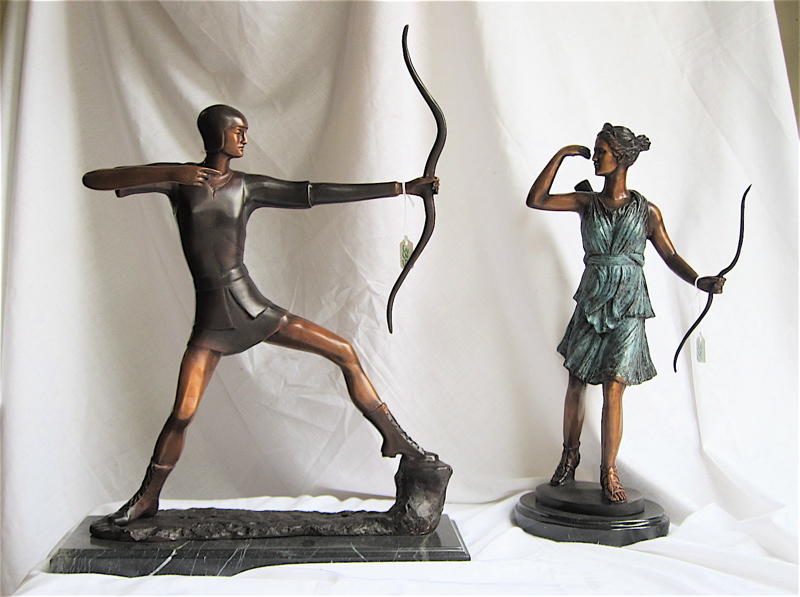 Appraisal: TWO PATINATED BRONZE STANDING ARCHER SCULPTURES both cast in standing