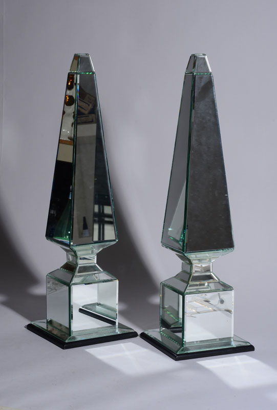 Appraisal: PAIR OF NEOCLASSICAL STYLE MIRRORED GLASS OBELISKS With beveled edges