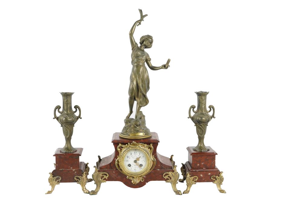 Appraisal: FRENCH STYLE ROUGE MARBLE METAL CLOCK GARNITUREcomprising figural clock and