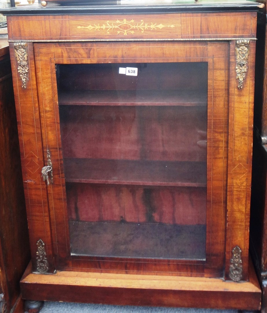 Appraisal: A Victorian marquetry inlaid walnut pier cabinet with single glazed