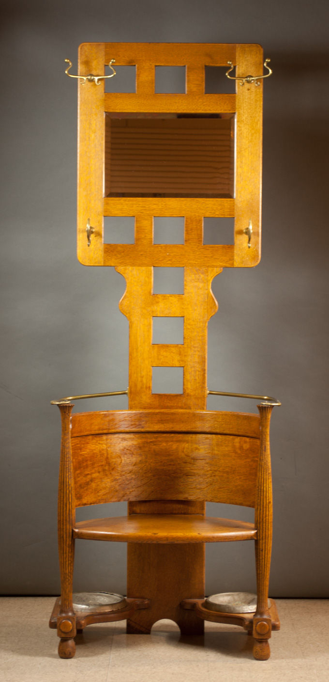 Appraisal: AN OAK SETTLE-BASE HALLSTAND American c Forming the top portion