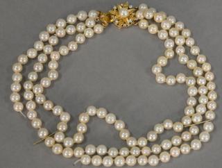 Appraisal: Pearl triple strand necklace with gold diamond and pearl clasp