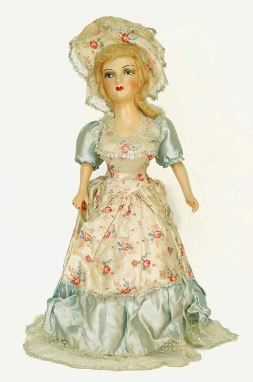 Appraisal: A bed doll Composition shoulder head Cloth body with composition