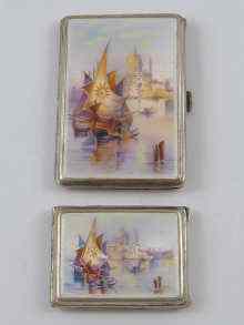 Appraisal: An enamelled silver cigarette case with matching match book cover