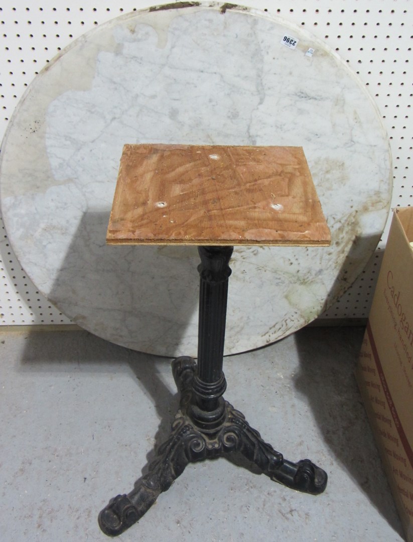 Appraisal: A circular marble topped cast iron table